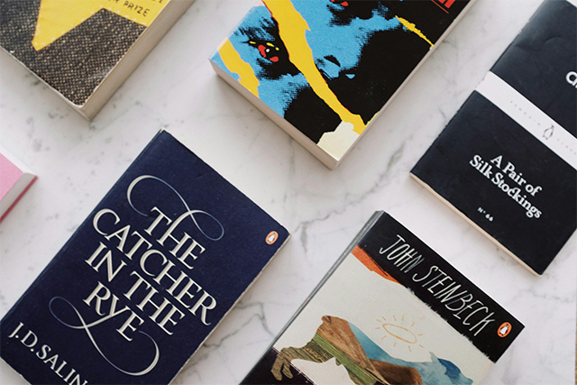 Books symbolizing the process of creating book covers for translated editions